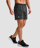 mid rise elastic waist slit short 5" in gray camo - on model side view