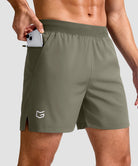 mid rise elastic waist slit short 5" in gray sage - pocket detail view