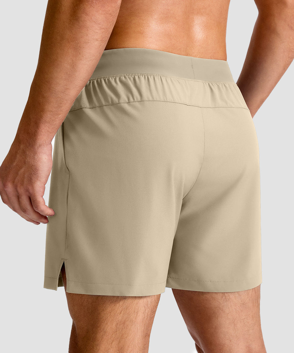 mid rise elastic waist slit short 5" in light khaki - back view