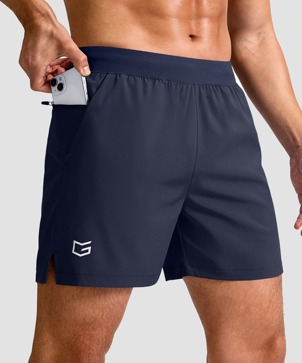 mid rise elastic waist slit short 5" in navy - front view