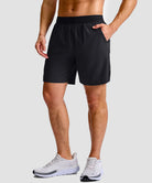 mid rise elastic waist slit short 7" in black - pocket detail view