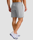 mid rise elastic waist slit short 7" in bright gray - on model back view