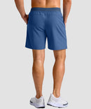 mid rise elastic waist slit short 7" in dusty blue - on model back view