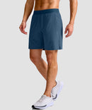 mid rise elastic waist slit short 7" in gray blue - on model side view