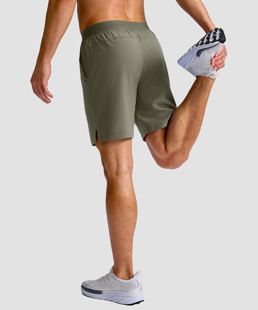 mid rise elastic waist slit short 7" in gray sage - on model back view