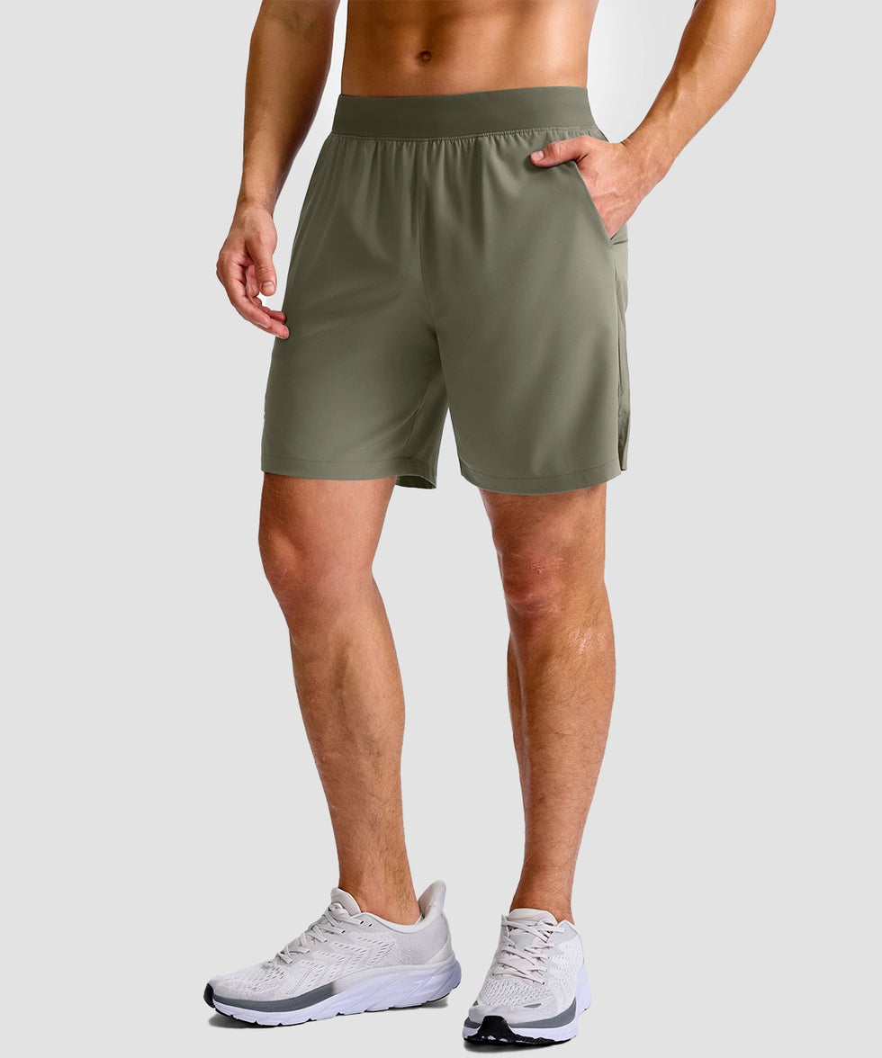 mid rise elastic waist slit short 7" in gray sage - on model front view