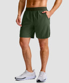 mid rise elastic waist slit short 7" in olive green - pocket detail view