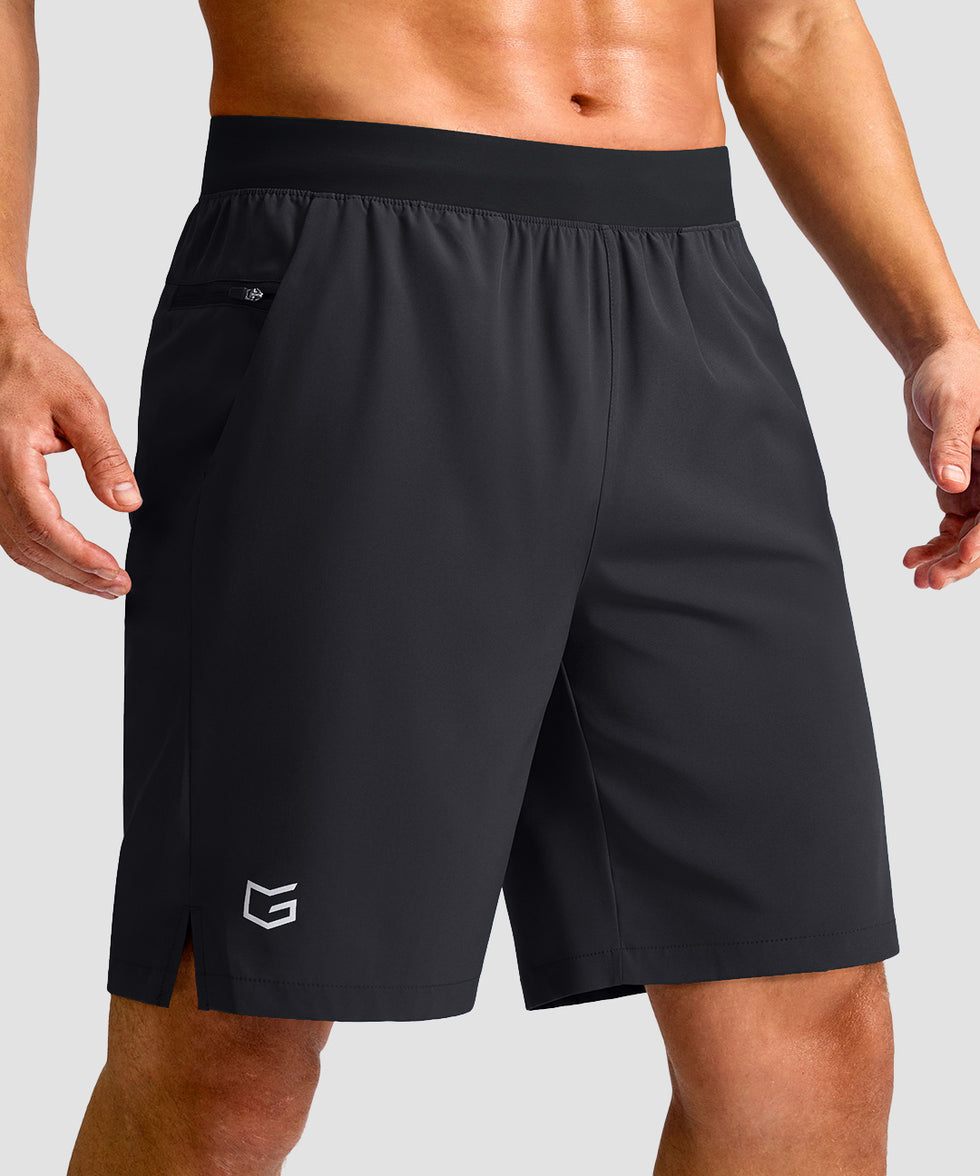 mid rise elastic waist slit short 9" in black - front view