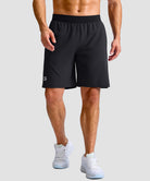 mid rise elastic waist slit short 9" in black - on model front view