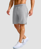 mid rise elastic waist slit short 9" in bright gray - on model side view