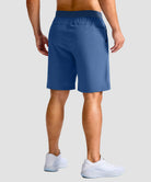mid rise elastic waist slit short 9" in dusty blue - on model back view