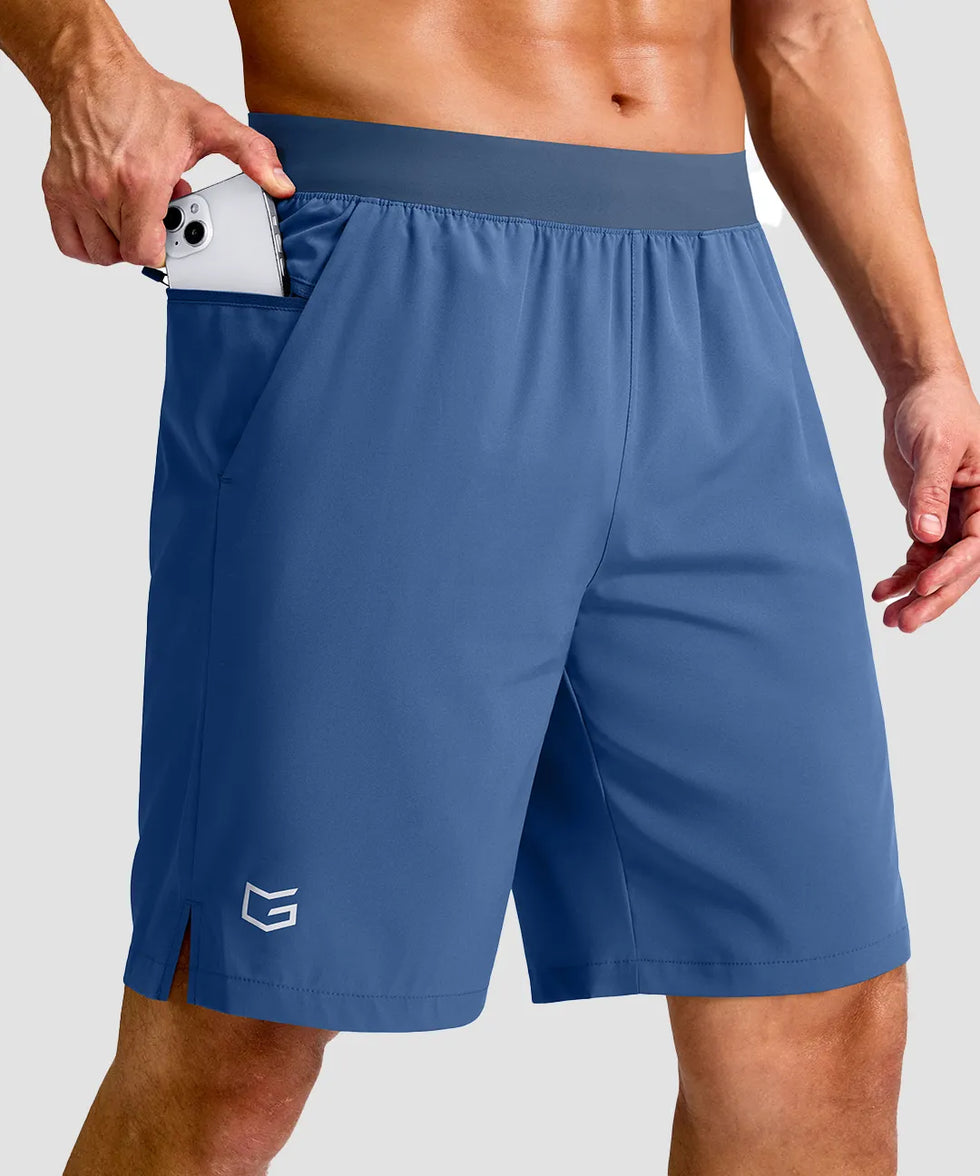 mid rise elastic waist slit short 9" in dusty blue - pocket detail view