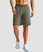 mid rise elastic waist slit short 9" in gray sage - on model front view