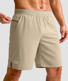 mid rise elastic waist slit short 9" in light khaki - front view