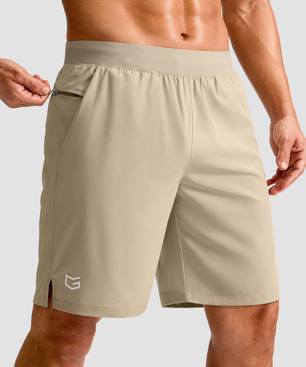 mid rise elastic waist slit short 9" in light khaki - front view