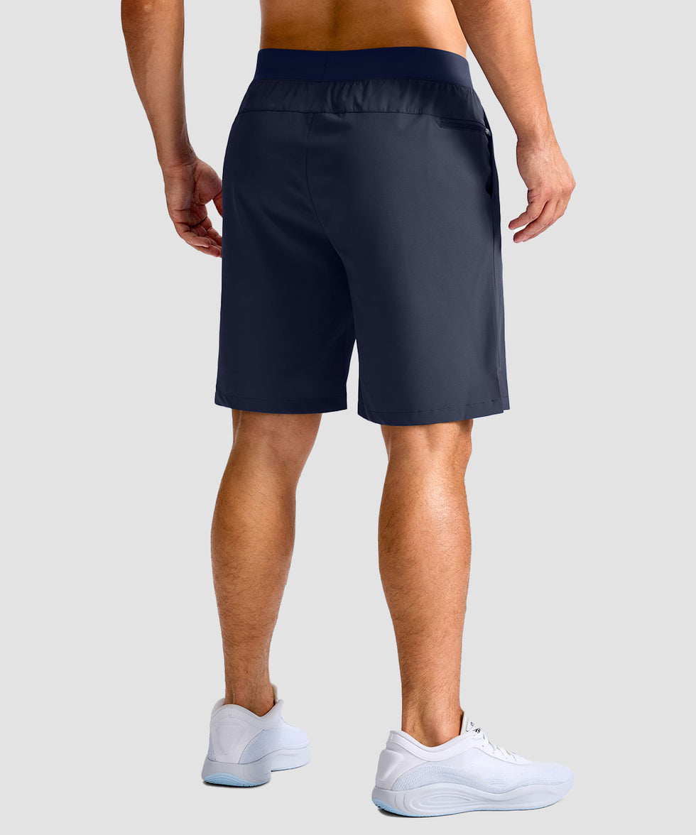 mid rise elastic waist slit short 9" in navy - on model back view