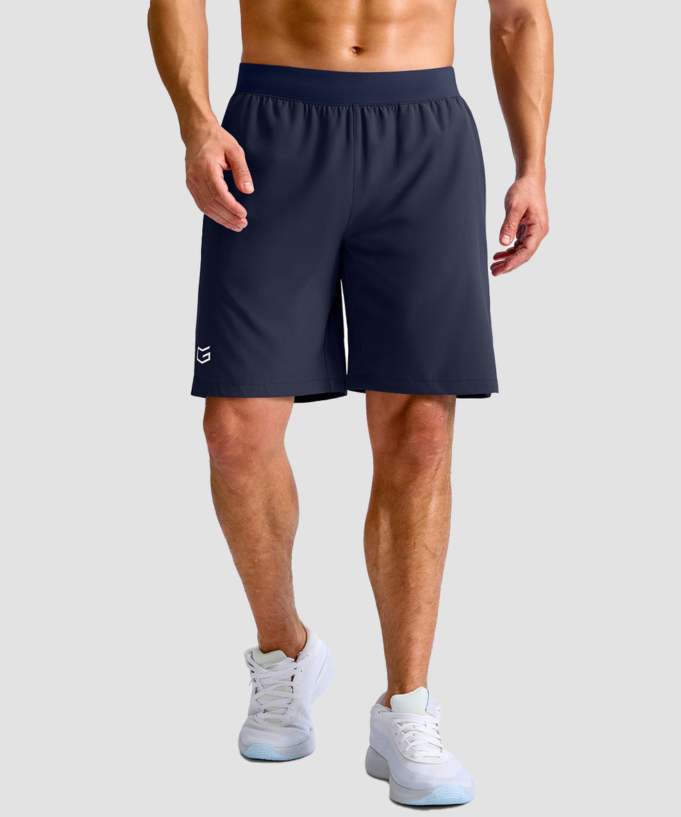 mid rise elastic waist slit short 9" in navy - on model front view
