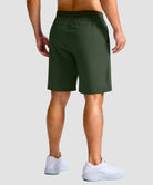 mid rise elastic waist slit short 9" in olive green - on model back view