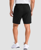moisture wicking athletic sweat shorts in black - on model back view