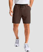 moisture wicking athletic sweat shorts in brown - on model front view