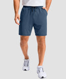 moisture wicking athletic sweat shorts in heather blue - on model front view