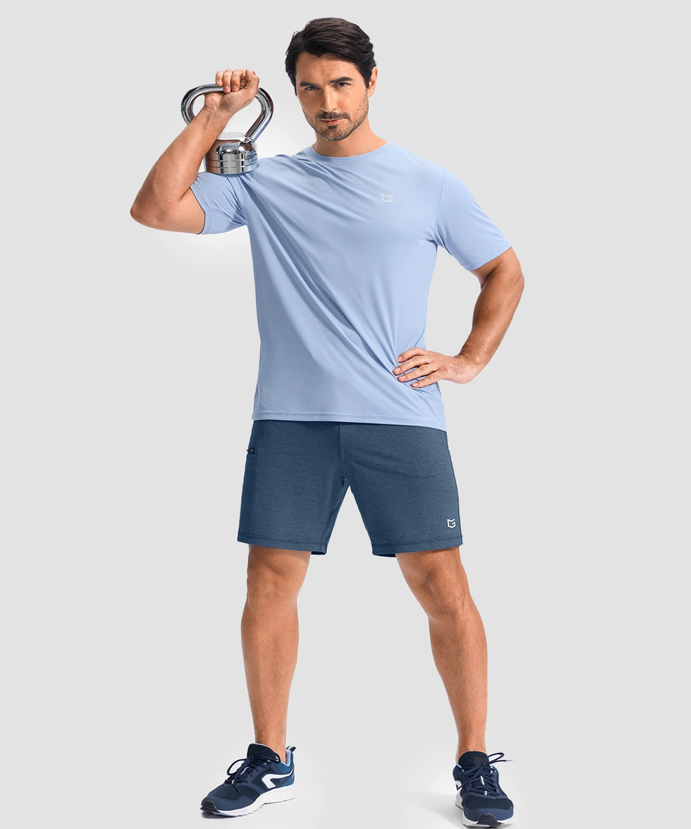 moisture wicking athletic sweat shorts in heather blue - on model kettlebell workout view