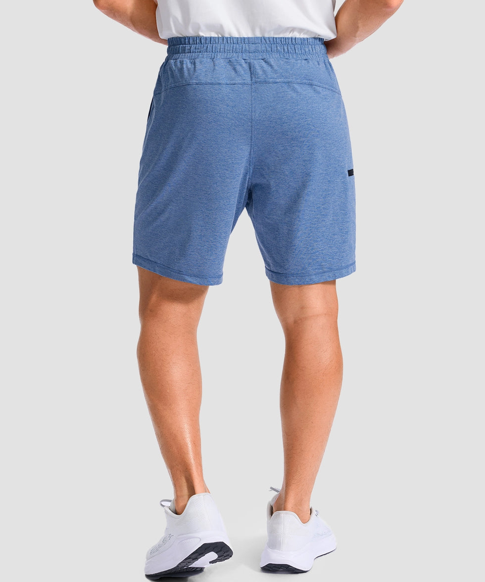 moisture wicking athletic sweat shorts in heather haze blue - on model back view