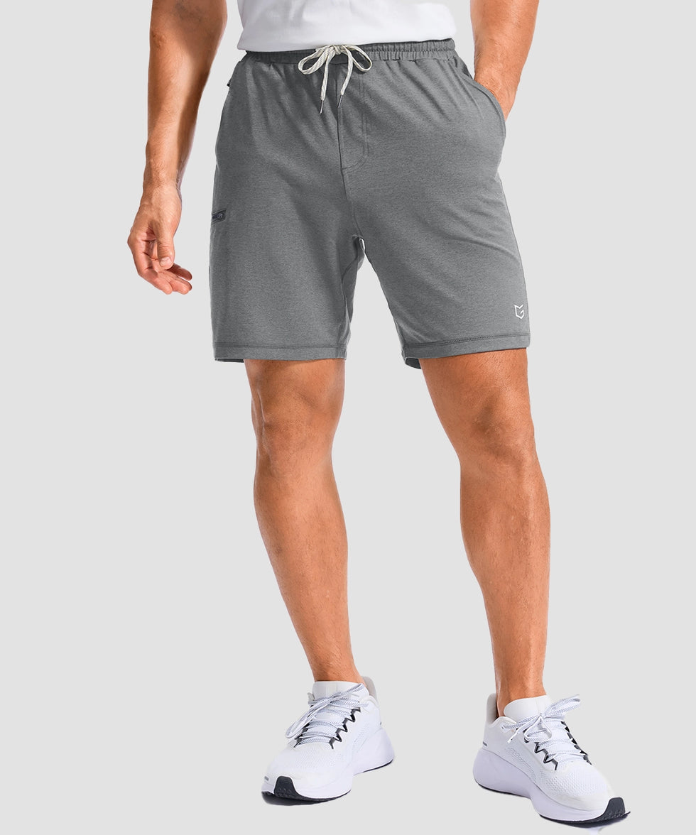 moisture wicking athletic sweat shorts in heather light gray - on model front view
