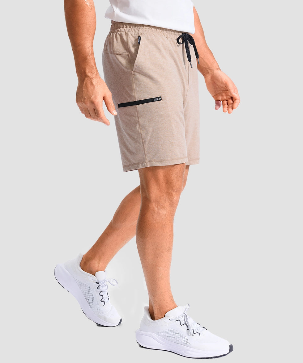moisture wicking athletic sweat shorts in heather light khaki - on model side view