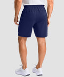 moisture wicking athletic sweat shorts in navy - on model back view