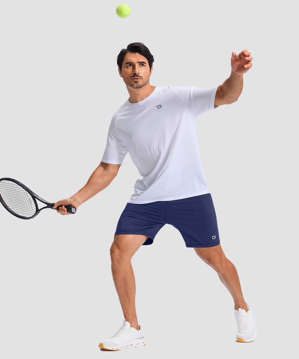 moisture wicking athletic sweat shorts in navy - on model play tennis view