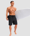 quick dry 9" pocketed board shorts in black - on model view