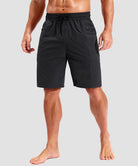 quick dry 9" pocketed board shorts in black - on model front view
