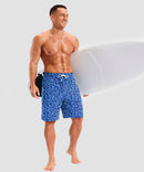 quick dry 9" pocketed board shorts in blue geometry - on model view