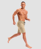 quick dry 9" pocketed board shorts in light khaki - on model