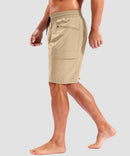 quick dry 9" pocketed board shorts in light khaki - on model side view