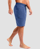 quick dry 9" pocketed board shorts in slate blue - on model side view
