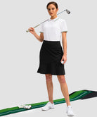 ruffle modest golf skort in black - front view