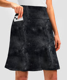 ruffle modest golf skort in black tie-dye - pocket details view