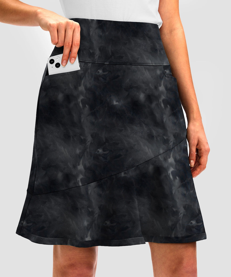 ruffle modest golf skort in black tie-dye - pocket details view