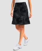 ruffle modest golf skort in black tie-dye - side view