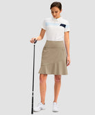 ruffle modest golf skort in light khaki - front view