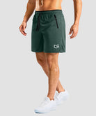 side slit zipper pocket short 7" in army green - on model side view