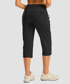 women's 3 zipper pockets hiking capri pants in black - back view
