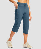 women's 3 zipper pockets hiking capri pants in indigo blue - pocket detail view