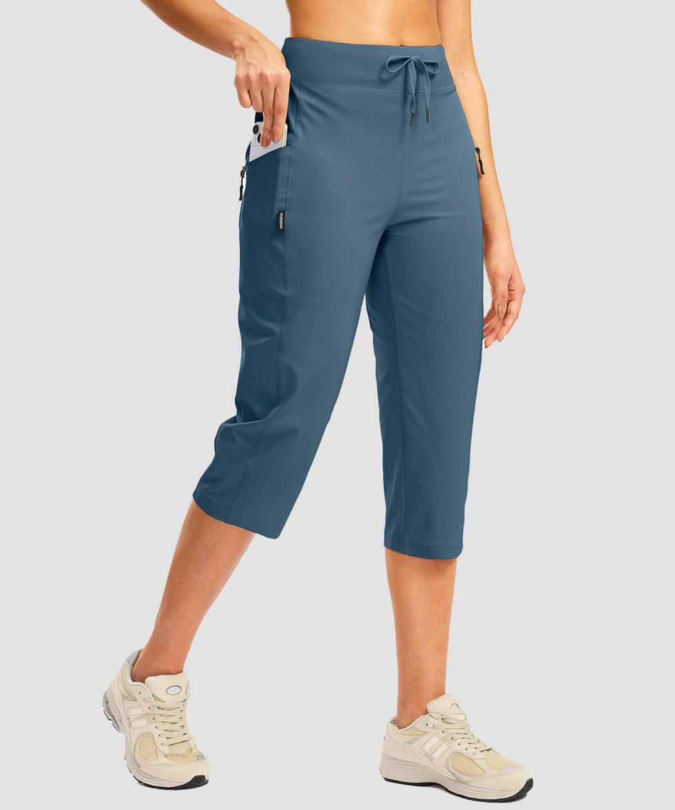 women's 3 zipper pockets hiking capri pants in indigo blue - pocket detail view