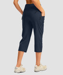 women's 3 zipper pockets hiking capri pants in navy - back view