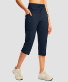 women's 3 zipper pockets hiking capri pants in navy - pocket detail view