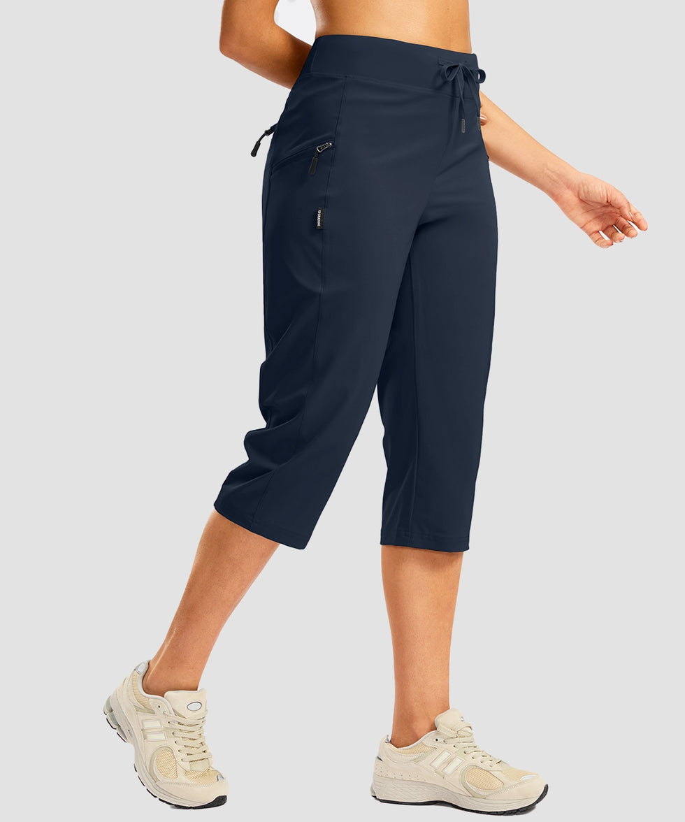 women's 3 zipper pockets hiking capri pants in navy - side view