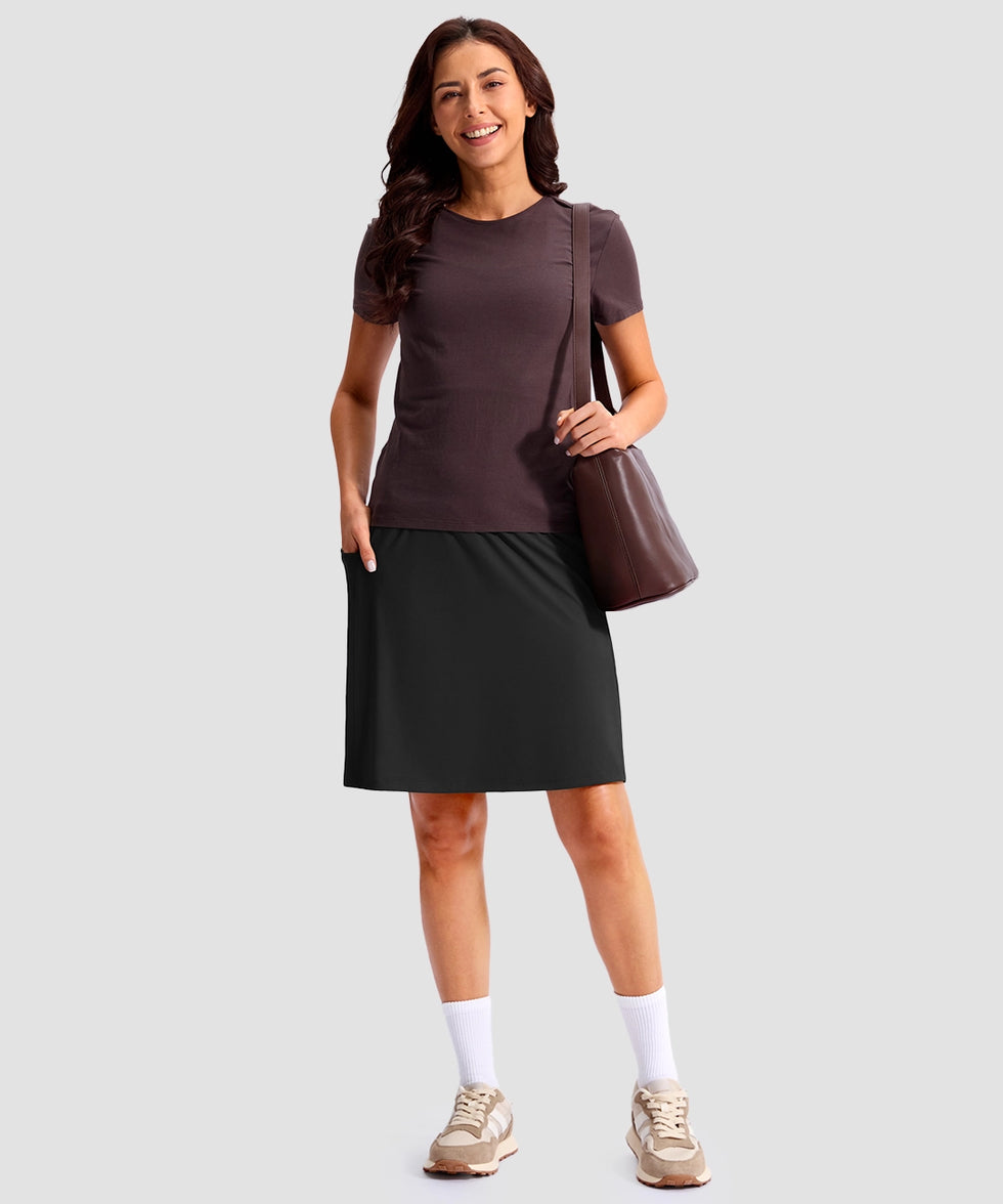 women's 4 pockets knee length golf skort in black - front view
